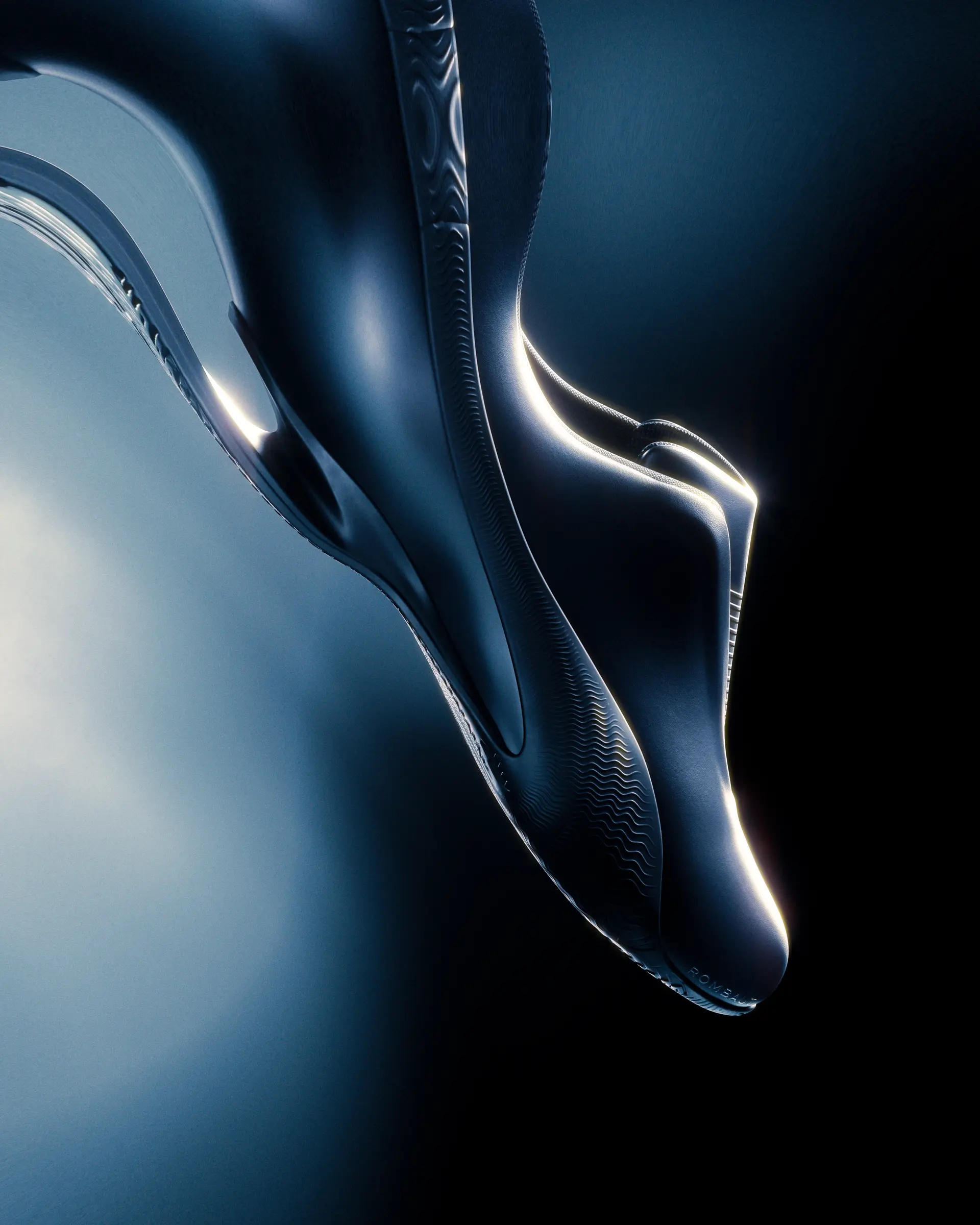 Close-up of a metallic object with reflective surface on a dark background