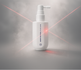 White adegen topical bottle with pump on a gray background